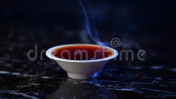 黑热中式茶杯大理石背景视频的预览图