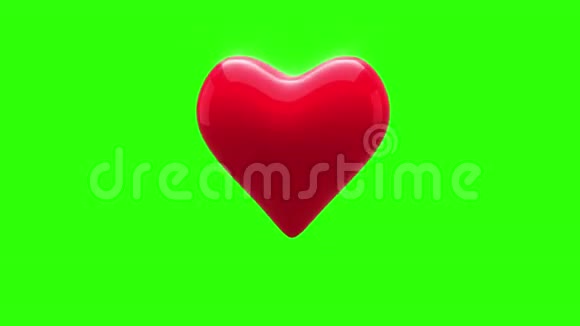 红色的心在绿色的背景上跳动视频的预览图