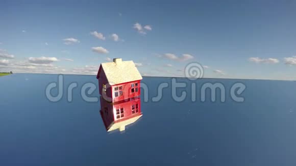 空间里镜子上的小红房子模型延时4K视频的预览图