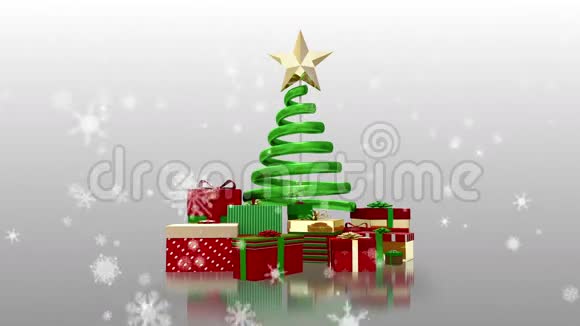 落在圣诞树上的雪花和礼物视频的预览图