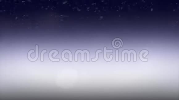 带雪的圣诞蓝色背景带雪的圣诞背景冬季背景视频的预览图