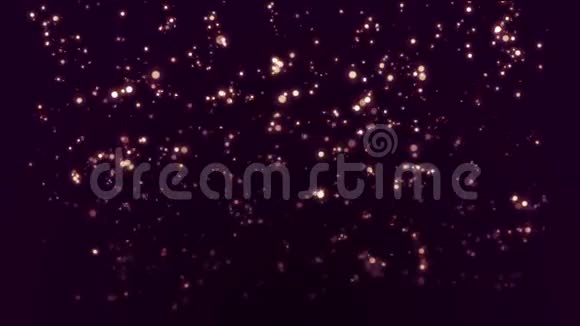深紫色背景下发光的小粒子视频的预览图