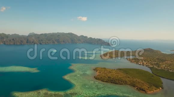 鸟瞰热带泻湖大海沙滩热带岛屿菲律宾巴拉望布桑加视频的预览图