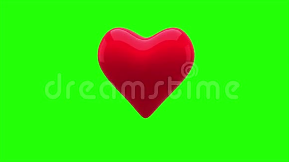 红色的心在绿色的背景上跳动视频的预览图