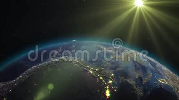 现实的地球在星空和太阳环的背景下在太空中旋转视频的预览图
