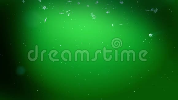 闪亮的3d雪花在绿色背景下在夜间缓慢地在空气中飞行用作圣诞新年贺卡视频的预览图