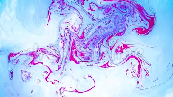 抽象的油漆油墨在运动迷幻的背景片段五颜六色的斑点视频的预览图