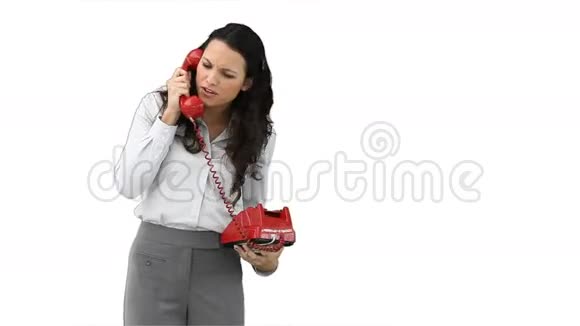 商务女性在红色电话上交谈视频的预览图