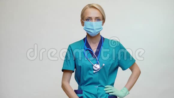 戴防护面罩橡胶或乳胶手套的医生护士视频的预览图