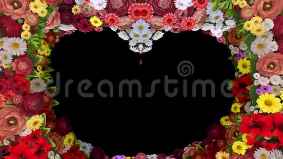 旋转的花朵在黑色背景上形成心脏轮廓的动画婚礼祝福模板视频的预览图