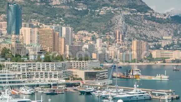 蒙特卡洛城市空中全景时间推移摩纳哥港口的豪华游艇和建筑景观科特德阿祖尔视频的预览图