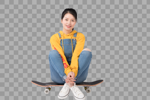 坐在滑板上的青春美少女图片图片素材免费下载