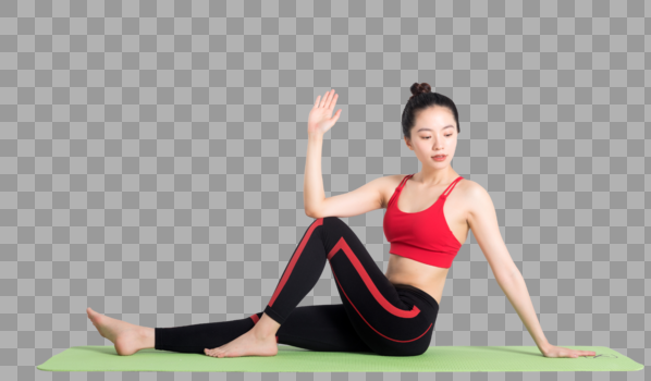 坐在瑜伽垫上做瑜伽动作的女性图片图片素材免费下载