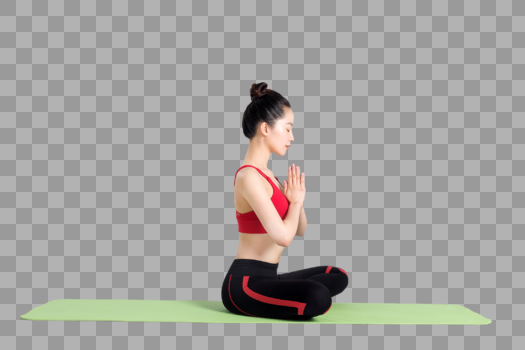 年轻女性做双手合十的瑜伽动作图片素材免费下载