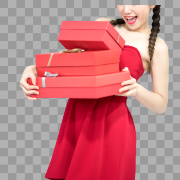 抱着礼盒的年轻女性图片素材免费下载
