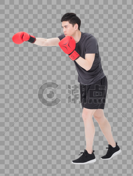 健身男性戴拳击手套打拳出拳图片素材免费下载