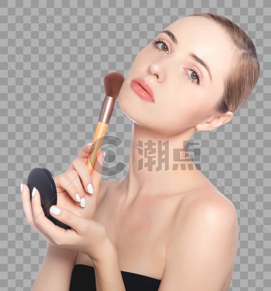 化妆拿着化妆刷的外国美女图片素材免费下载