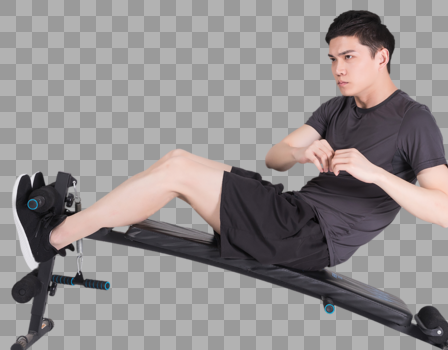 仰卧板上做仰卧起坐的健身男性图片素材免费下载