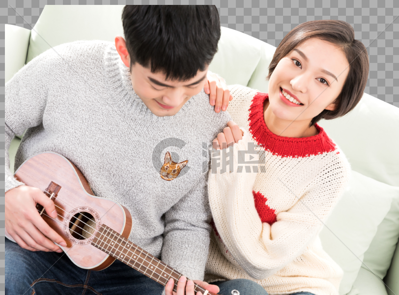 情侣一起在沙发上弹琴图片素材免费下载