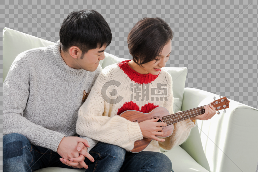 情侣一起在沙发上弹琴图片素材免费下载
