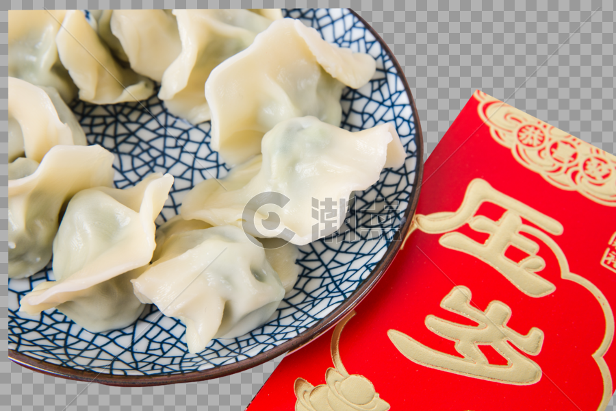 新春过年红色背景上的一盘饺子图片素材免费下载