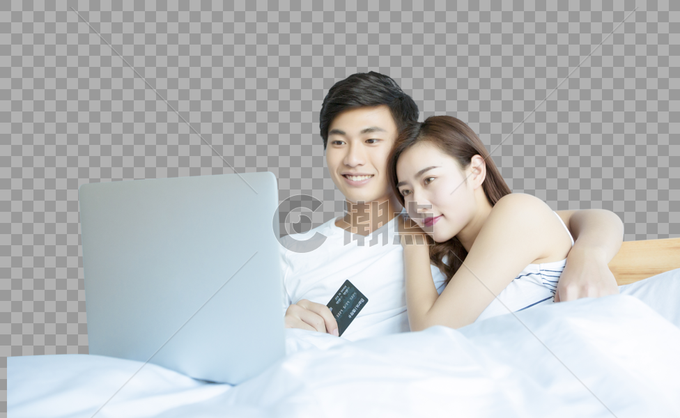 年轻情侣在床上网购图片素材免费下载