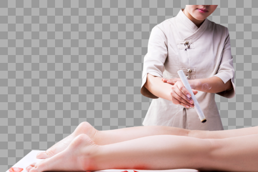 美容养生技师给腿部艾灸图片素材免费下载