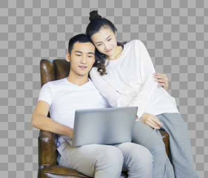 年轻夫妇在客厅玩电脑图片素材免费下载