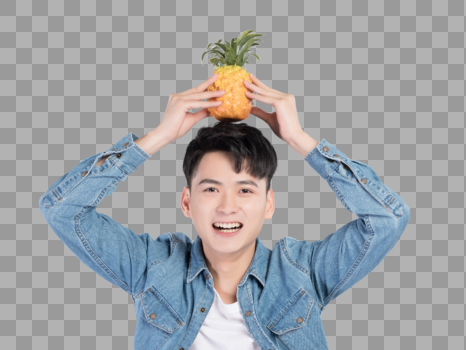 手持菠萝的青年男性图片素材免费下载