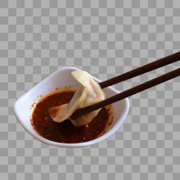吃水饺时沾辣椒酱料图片素材免费下载