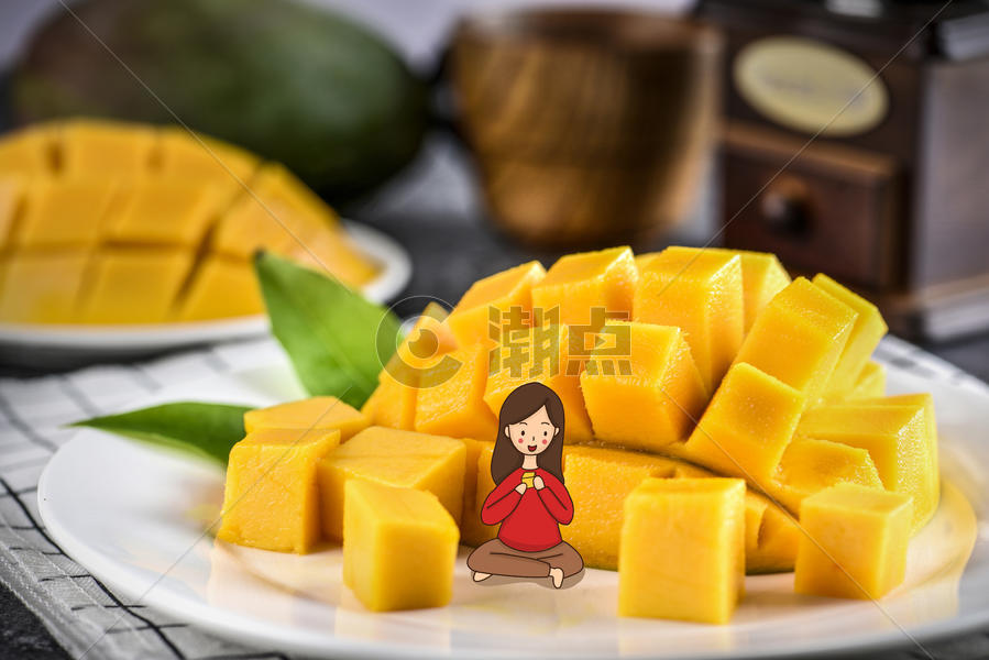 吃芒果的女孩图片素材免费下载