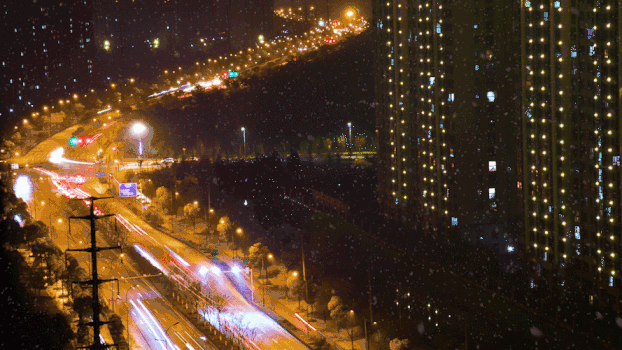 风雪城市夜景延时交通GIF图片素材免费下载
