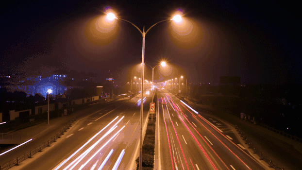 深夜朦胧路灯下公路交通延时GIF图片素材免费下载