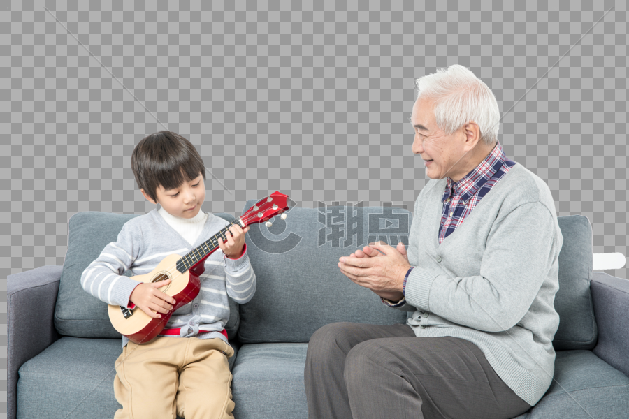 爷孙俩坐在沙发上弹琴图片素材免费下载
