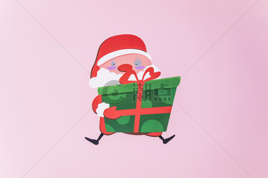 抱着礼物的圣诞老人图片素材免费下载
