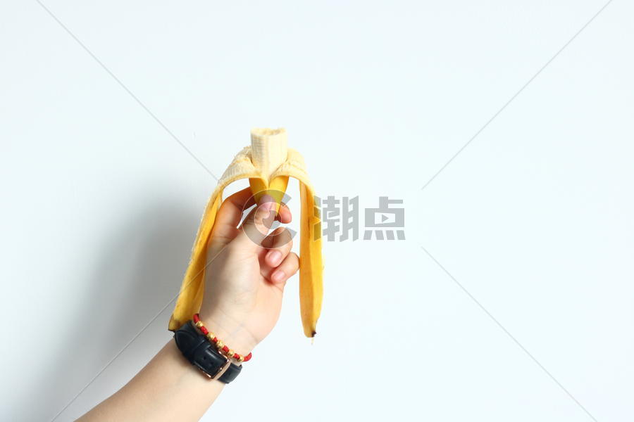 手拿香蕉图片素材免费下载