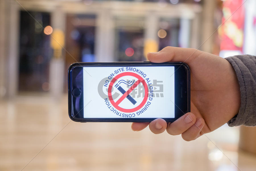 用手机宣传世界禁烟日图片素材免费下载