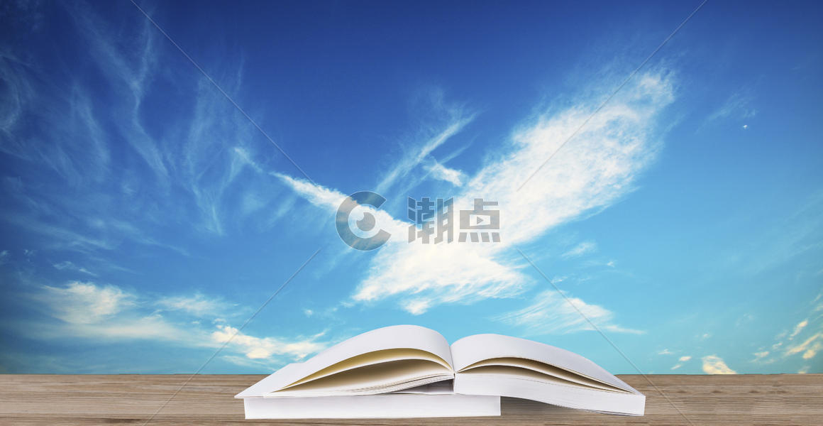 蓝天白云下的书图片素材免费下载