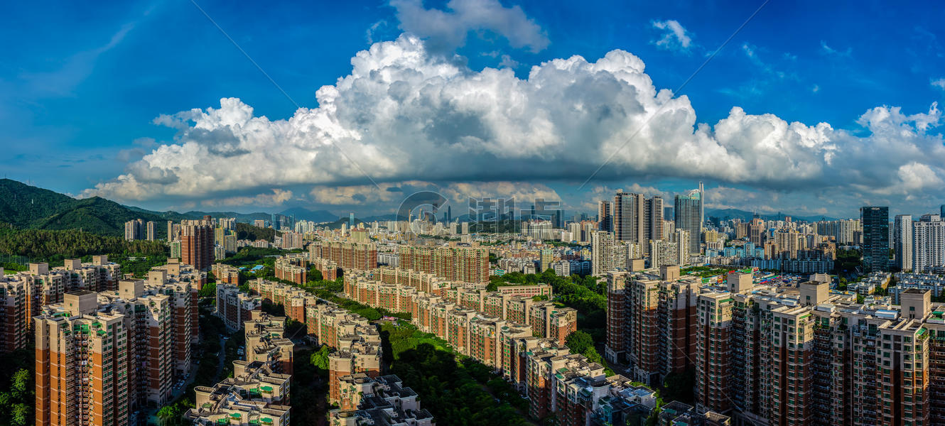 蓝天白云下的城市风光图片素材免费下载