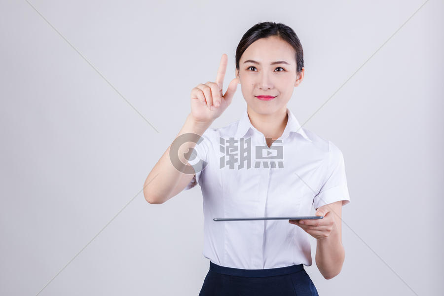 商务女士用平板电脑图片素材免费下载