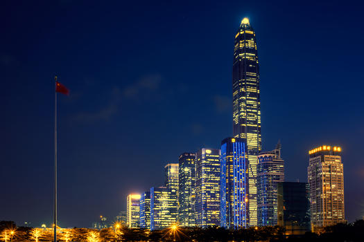 国旗与高楼大厦夜景图片素材免费下载