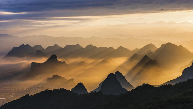 耶稣之光下的桂林山水剪影图片素材免费下载