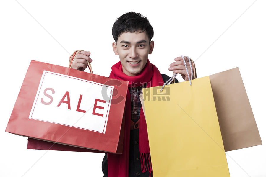 新年喜庆男士人像手持打折购物袋图片素材免费下载