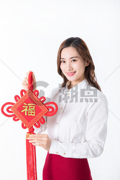 新年商务女性手拿中国结图片素材免费下载