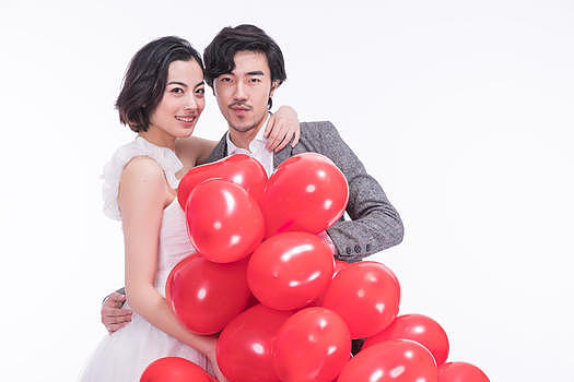 新婚夫妻手拿气球图片素材免费下载