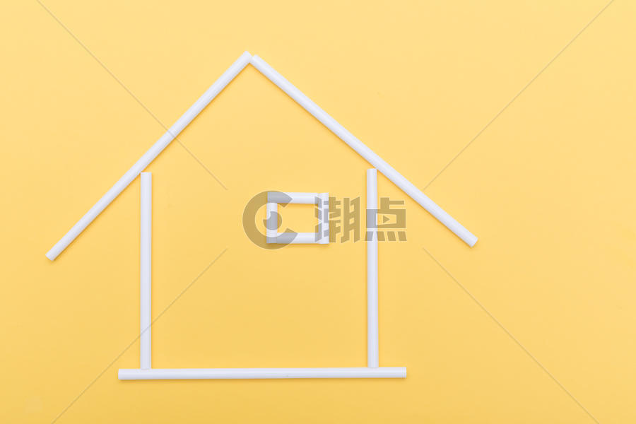 黄色背景上的简易房子图片素材免费下载