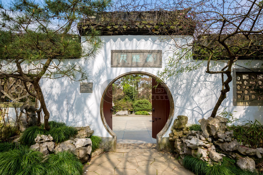 中式园林圆型门洞植物园梅园的门图片素材免费下载