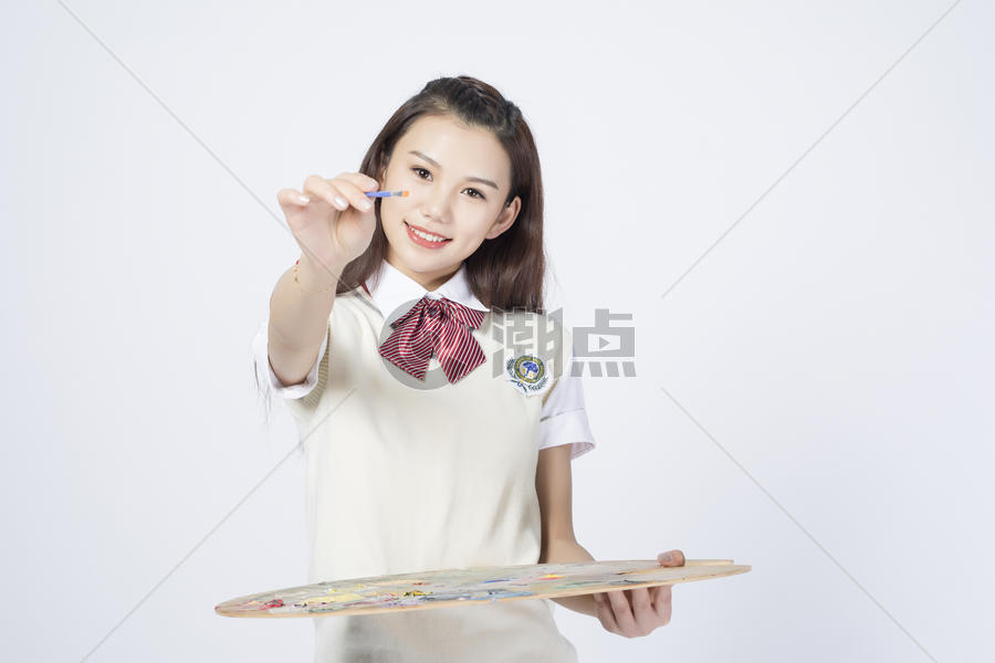 拿着画板的女学生图片素材免费下载