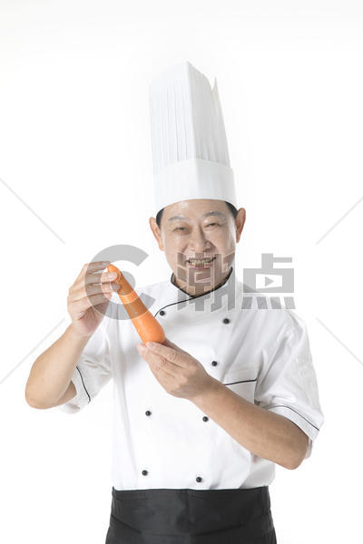 厨师拿胡萝卜图片素材免费下载