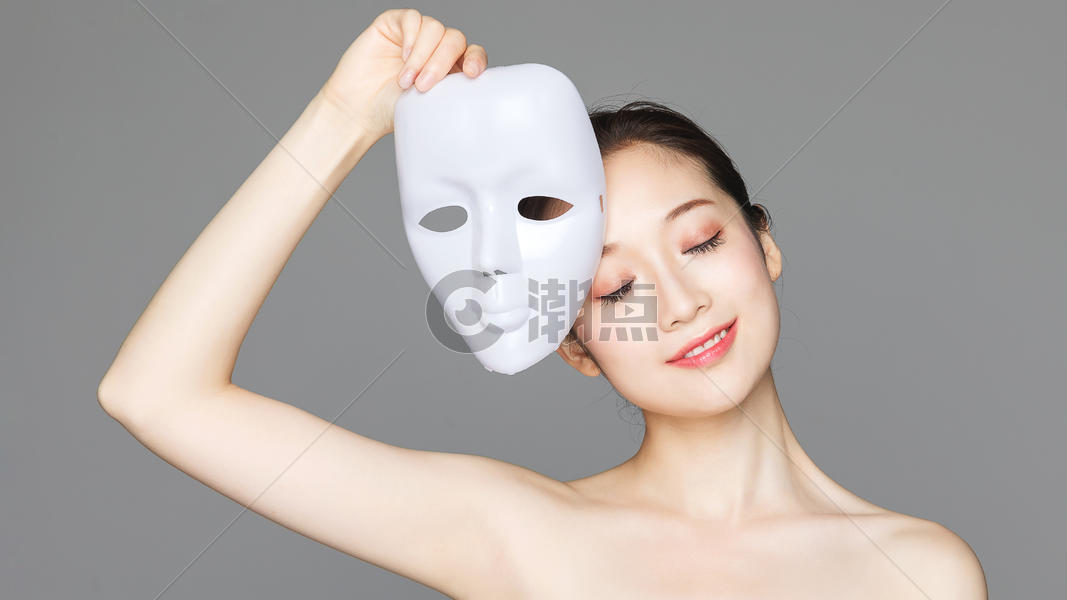 戴面具的美女图片素材免费下载